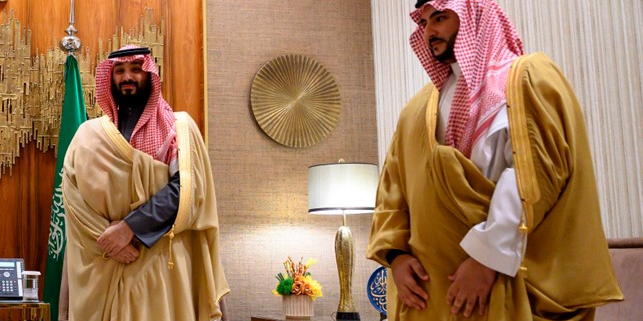 Saudi Arabia's Crown Prince Mohammed bin Salman (L) and Saudi Deputy Defense Minister Khalid Bin Salman